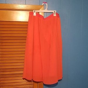 Bright orange skirt